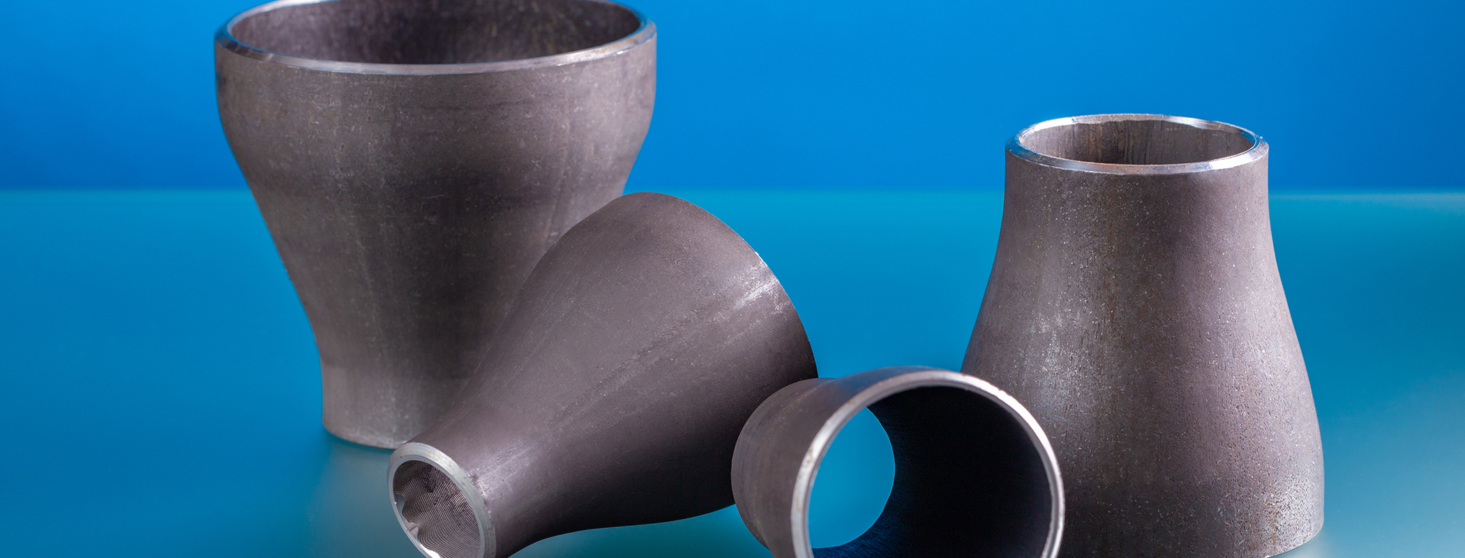 Concentric reducers, set of steel welding fittings.